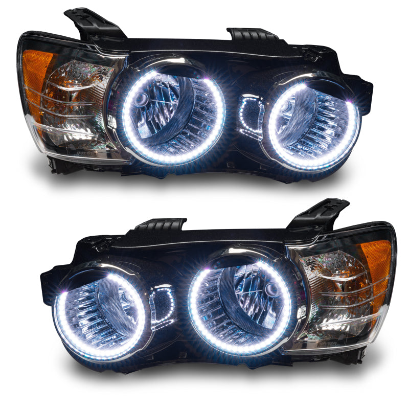 Oracle 12-15 Chevrolet Sonic pre-assembled SMD headlights with white halo rings in Chrome and Black housing options.