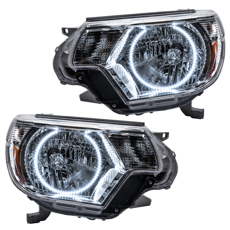 Oracle 12-15 Toyota Tacoma SMD HL headlights with white halo rings, showcasing chrome and black housing options.