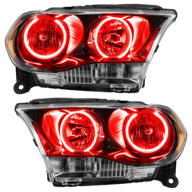 Oracle 11-13 Dodge Durango SMD HL Halogen headlights in black housing with red halo rings, showcasing a modern design.