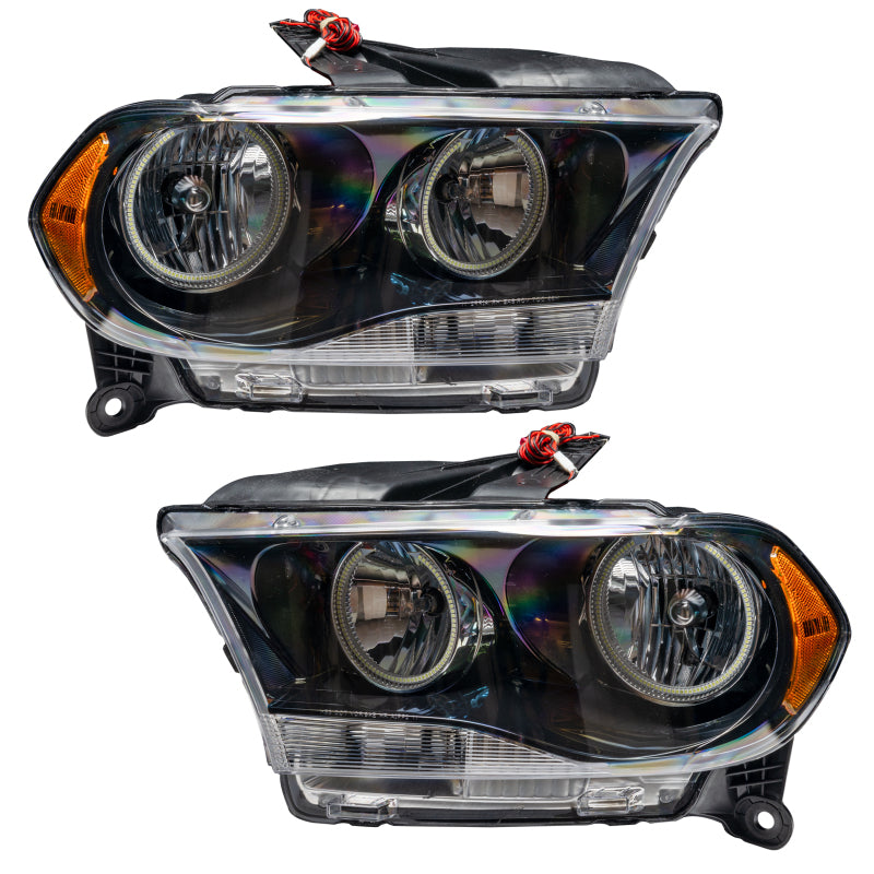 Oracle 11-13 Dodge Durango SMD HL Halogen headlights in black housing with red halo rings, showcasing a modern design.