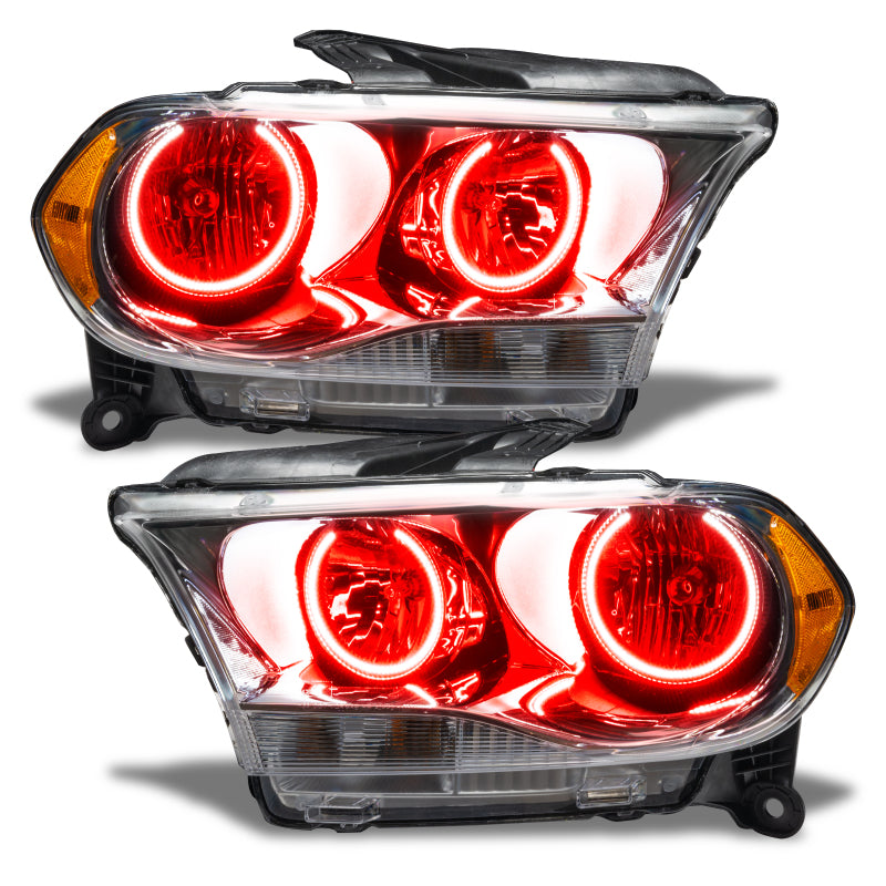 Oracle 11-13 Dodge Durango SMD HL Halogen headlights with chrome housing and red halo rings, showcasing modern automotive lighting design.