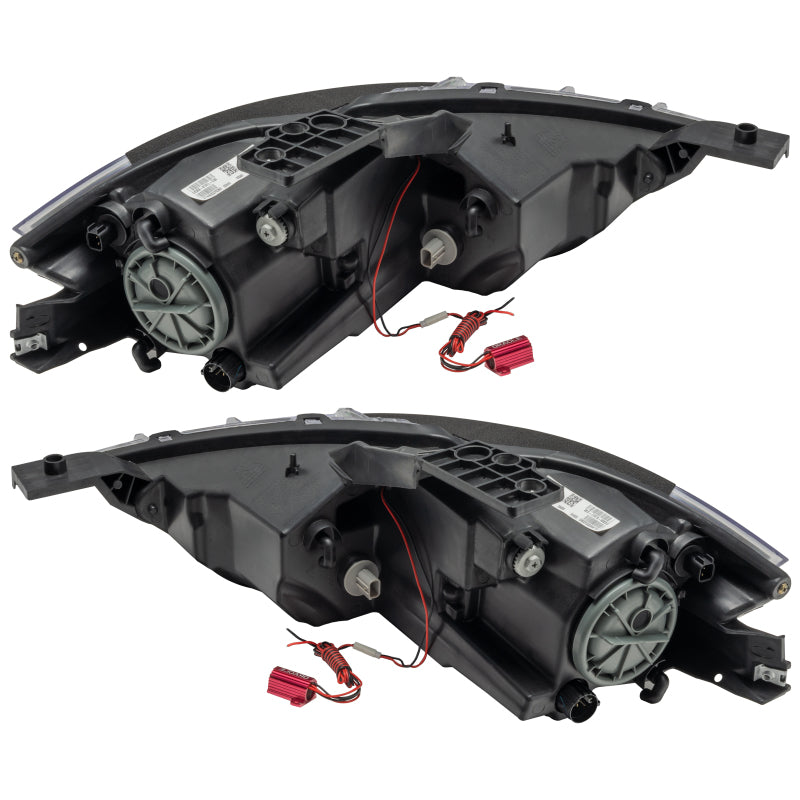 Oracle pre-assembled black halogen headlights for 2013-2016 Dodge Dart with white halo rings installed.