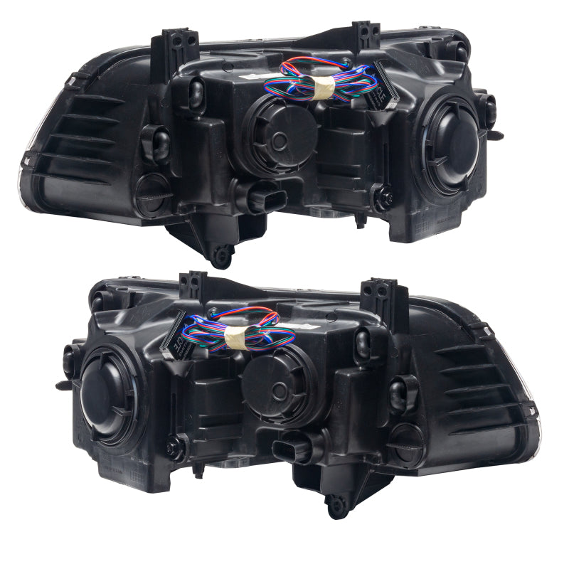 Oracle 11-14 Chrysler 300C SMD headlights in black housing with blue halo rings, showcasing a modern and stylish design.