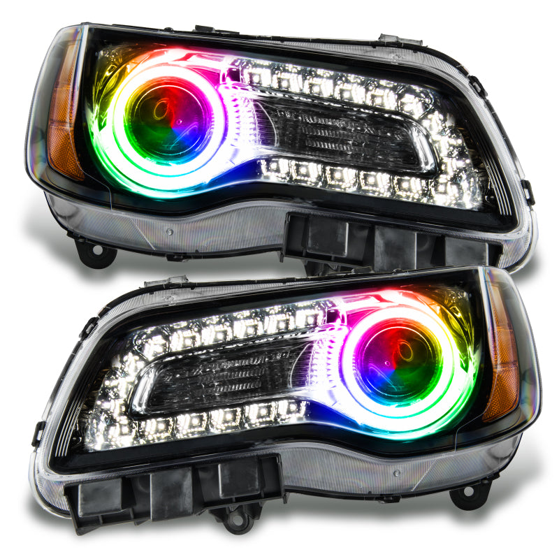 Oracle 11-14 Chrysler 300C SMD headlights in black housing with ColorSHIFT halo rings, showcasing a modern design.