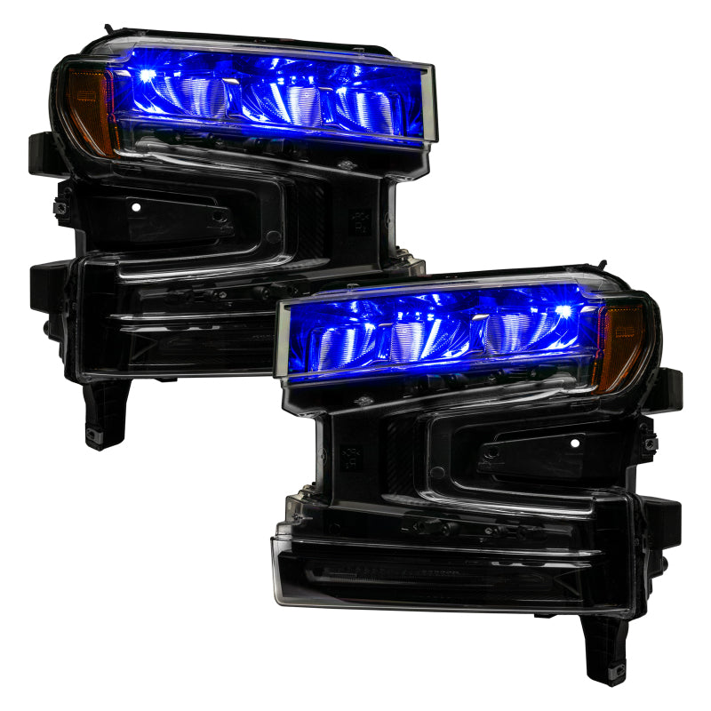 Oracle 19-21 Silverado/Sierra 1500 RGB Demon Eye Headlight Upgrade Kit showcasing vibrant color-changing LED lights.