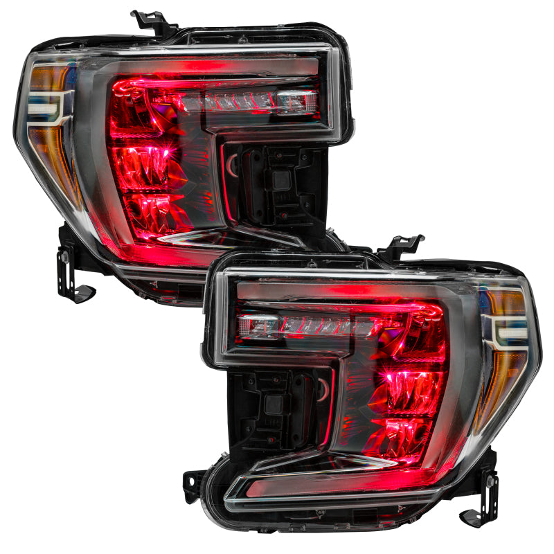 Oracle 19-21 Silverado/Sierra 1500 RGB Demon Eye Headlight Upgrade Kit showcasing vibrant color-changing LED lights.