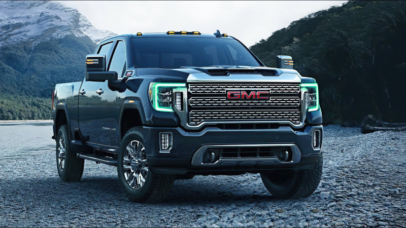 Oracle RGB+W Headlight DRL Upgrade Kit for 2020-2021 GMC Sierra 2500/3500 HD, showcasing vibrant color options and true white functionality.