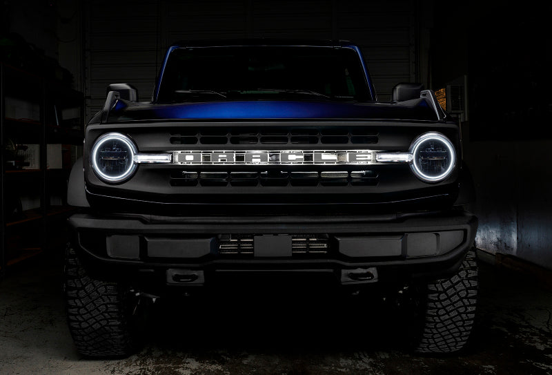 Oracle 21-22 Ford Bronco Headlight Halo Kit with DRL Bar showcasing vibrant LED lights and sleek design.