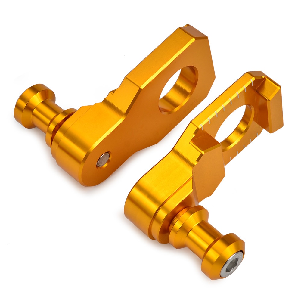 Gold anodized motorcycle chain adjusters.