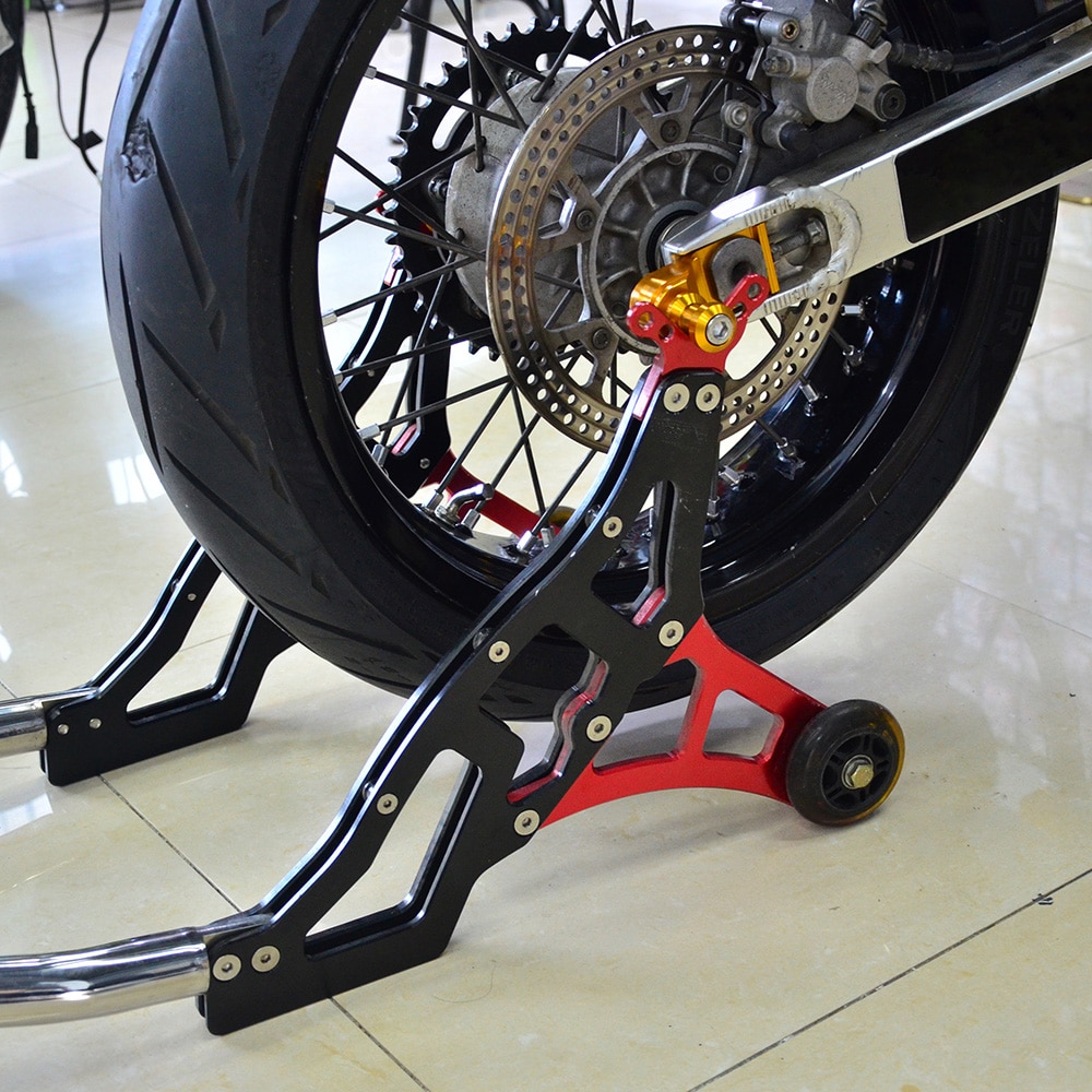 Motorcycle rear wheel on stand.