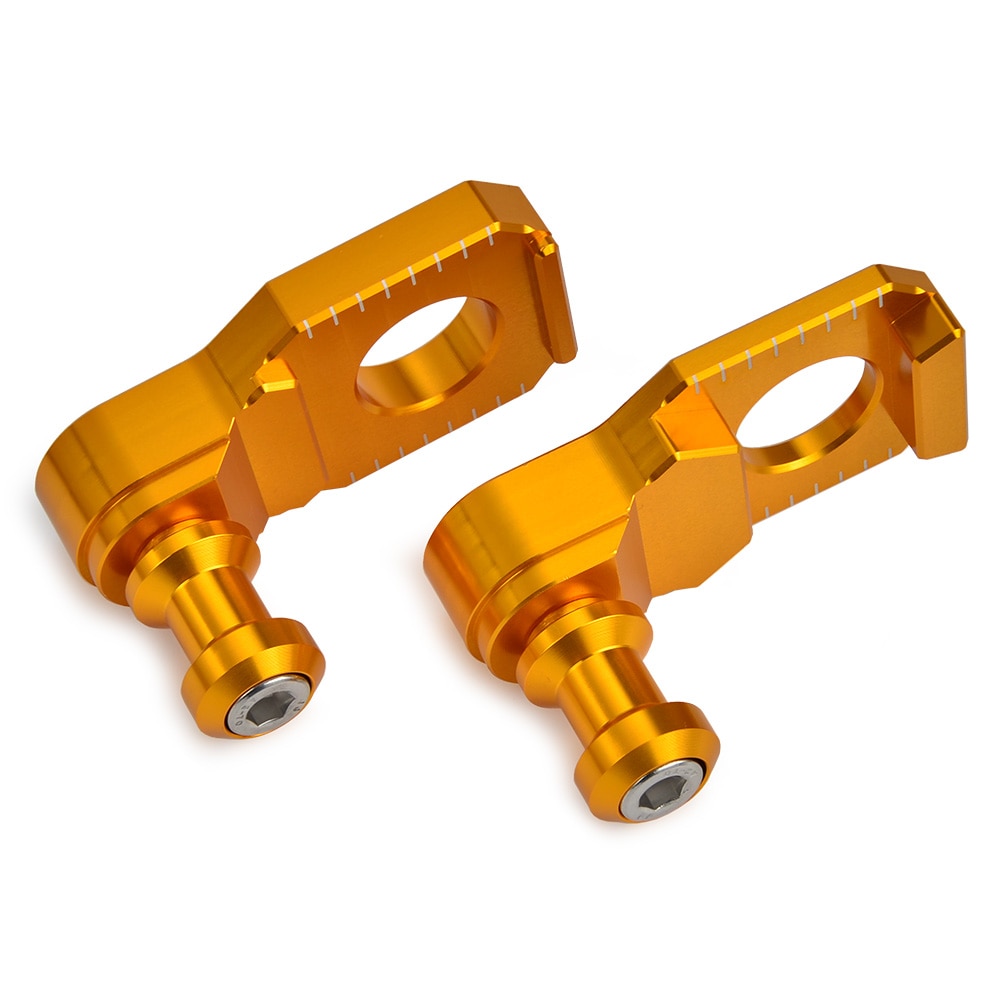 Gold motorcycle chain adjusters.