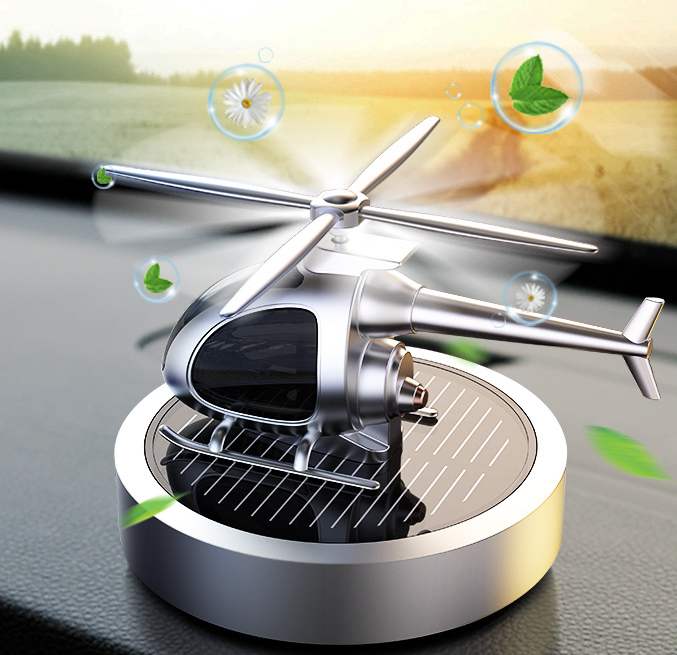 Solar Powered Car Perfume Ornament made of aluminum alloy, featuring a sleek design with an aircraft motif, perfect for enhancing car interiors.