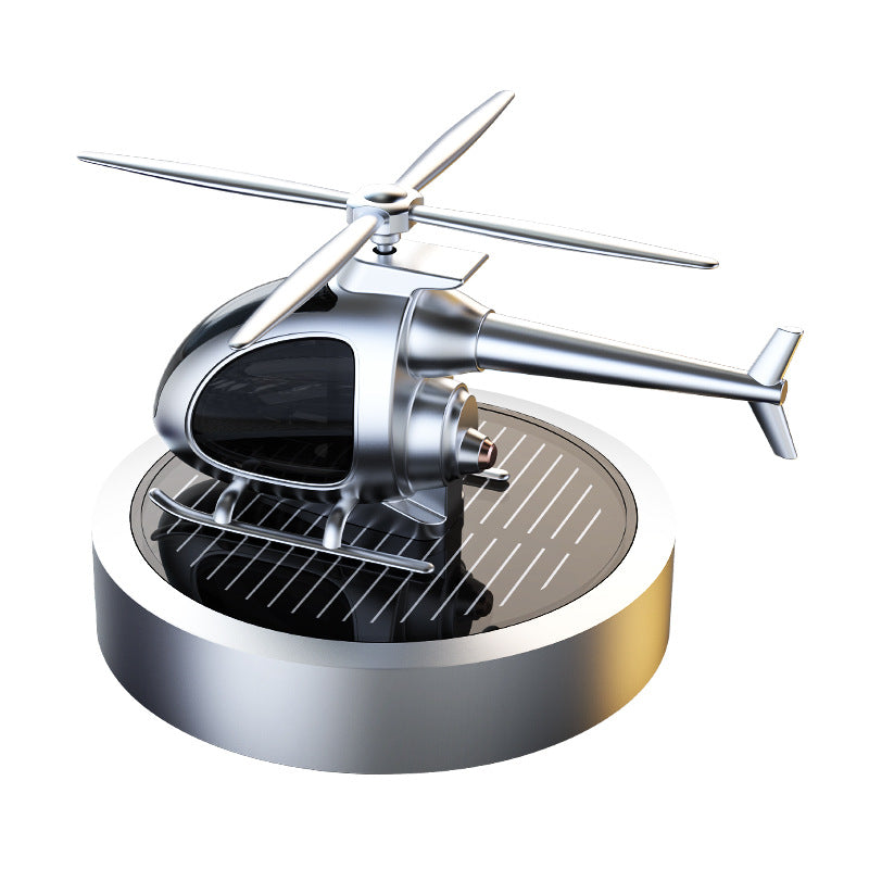 Solar Powered Car Perfume Ornament made of aluminum alloy, featuring a sleek design with an aircraft motif, perfect for enhancing car interiors.