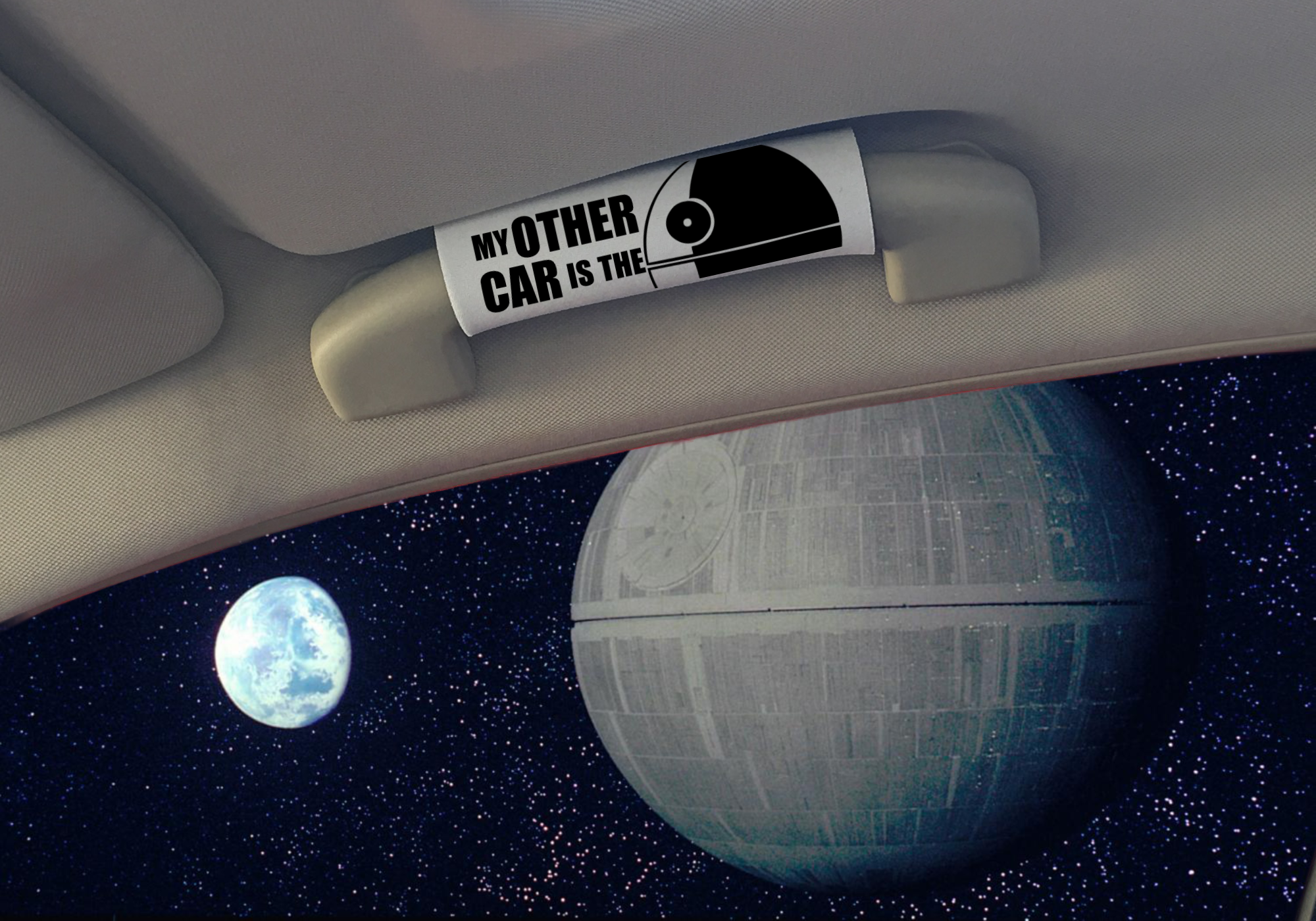 The DeathStar Grip featuring smooth artwork and a soft base, designed for vehicle interiors.