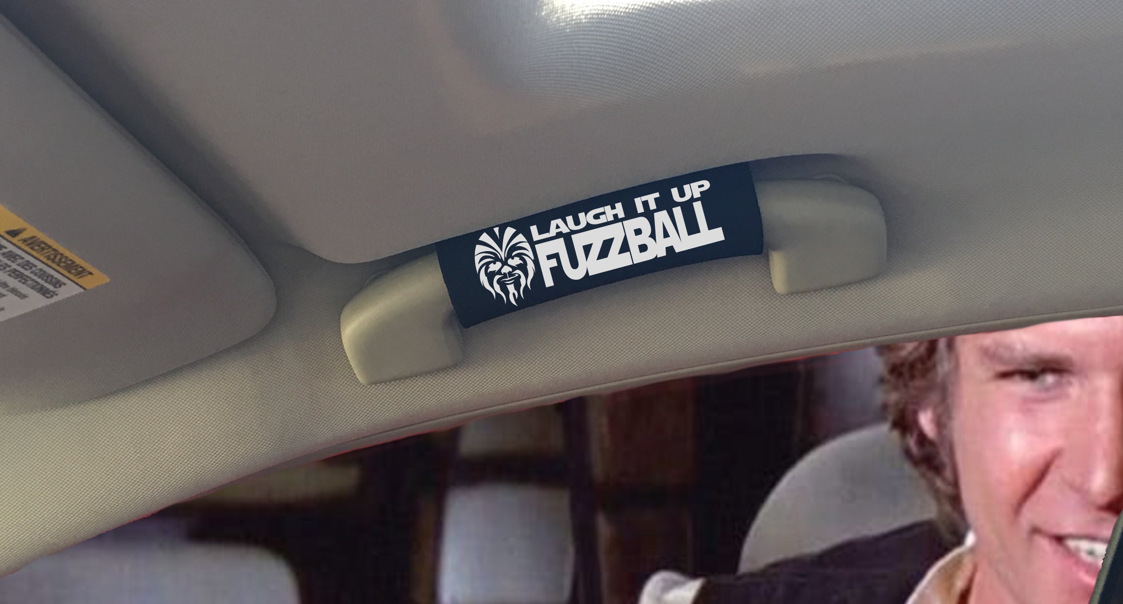 The Fuzzball Grip featuring smooth artwork and a super-soft base, designed for comfort and style in vehicles.