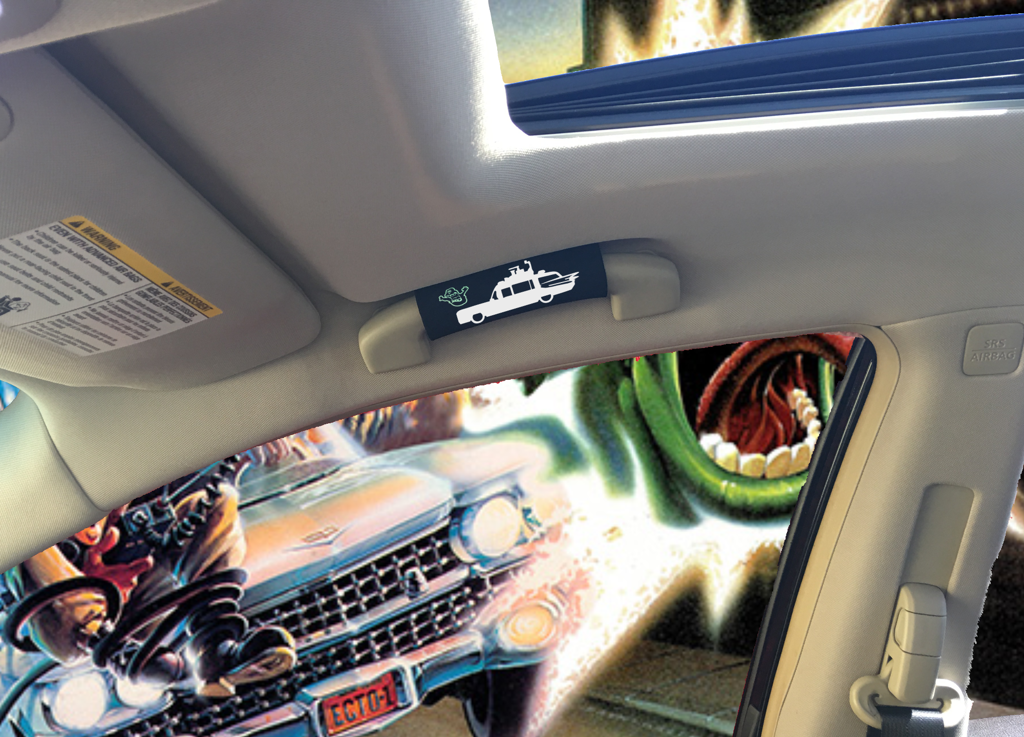 The Ghostbuster Grip featuring Slimer artwork that glows in the dark, designed for vehicle comfort and style.