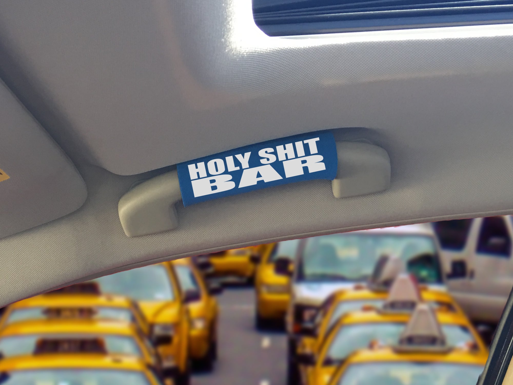 The Holy Shit Bar® featuring smooth artwork and a super-soft base, designed for vehicles with various color options.