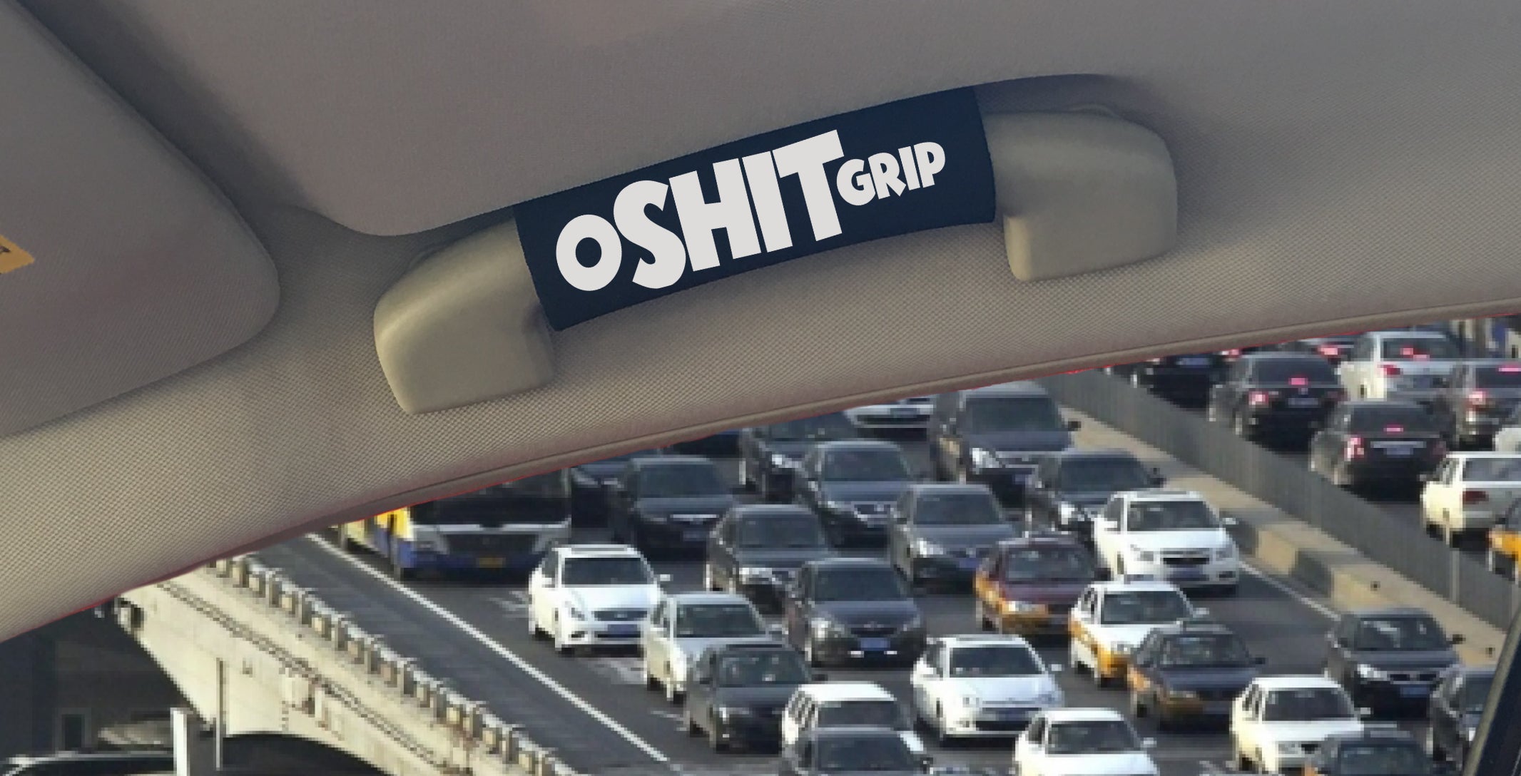 The O Shit Grip™ 2.0 featuring smooth artwork and a super-soft base, designed for vehicle interiors.