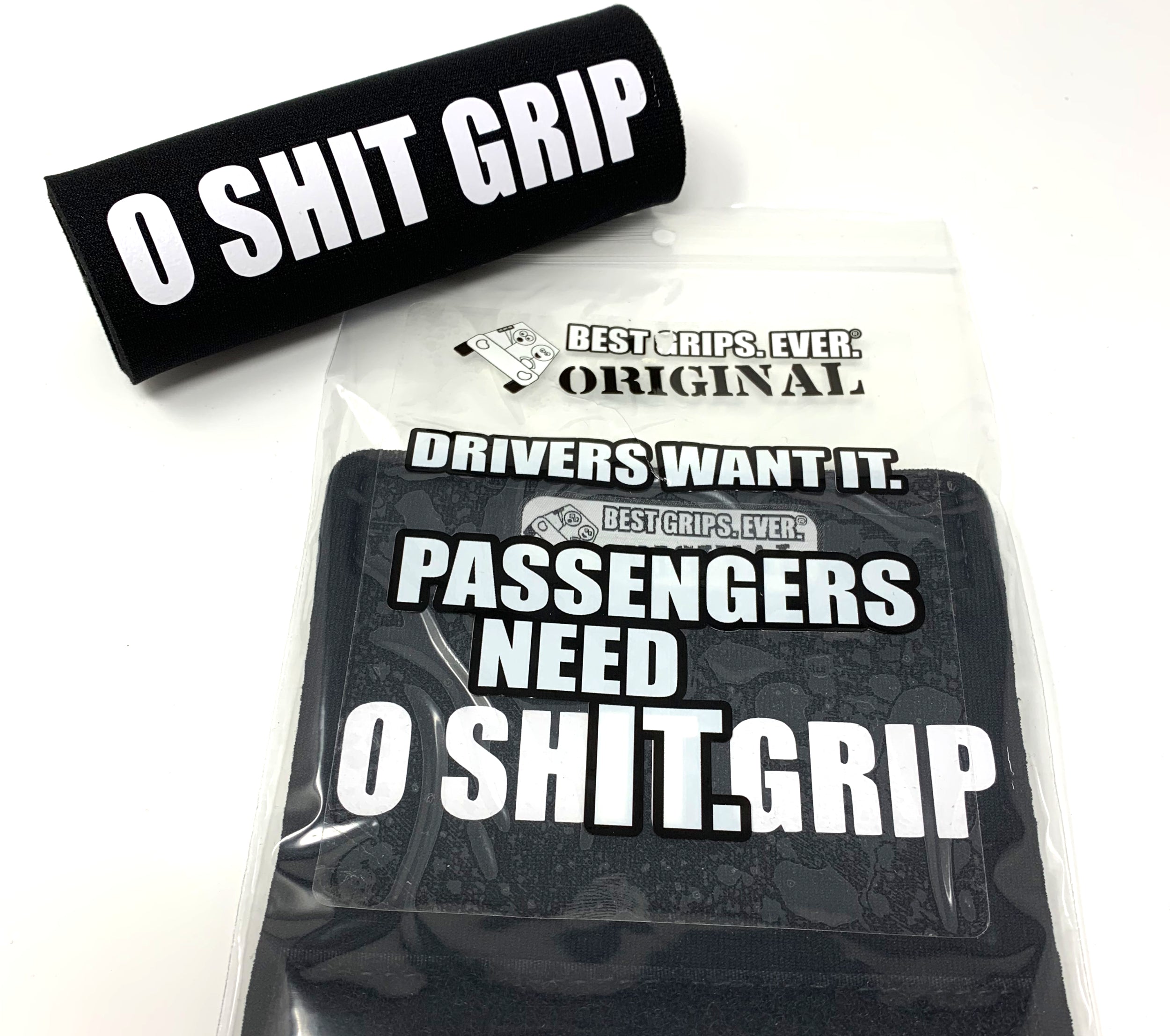 The O Shit Grip® featuring smooth artwork and a super-soft base, available in various colors for a fun vehicle accessory.