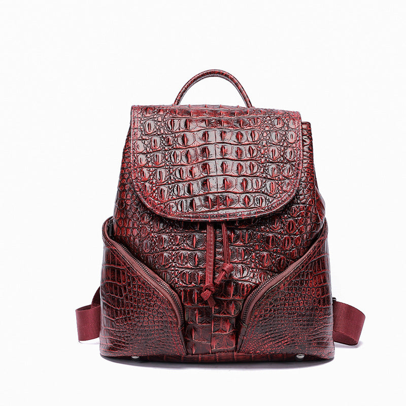 Ancient Style Solid Color Crocodile Pattern Backpack made from first layer cowhide, featuring a stylish crocodile pattern and versatile shoulder straps.