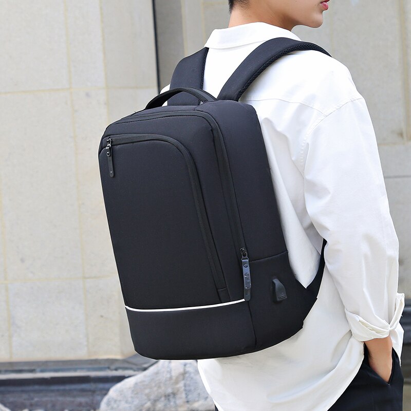 A high-quality nylon backpack designed for male business fashion, featuring a sleek design, multiple compartments, and a capacity for a 15.6-inch laptop.