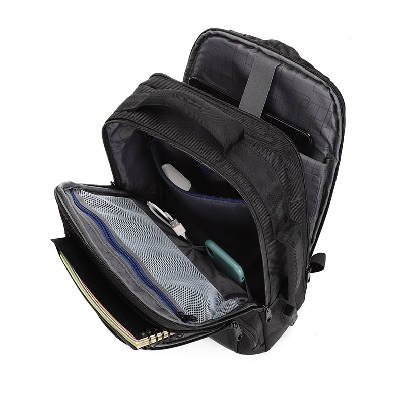 Stylish waterproof backpack for men, designed for laptops up to 15.6 inches, featuring USB charging port and anti-theft design.