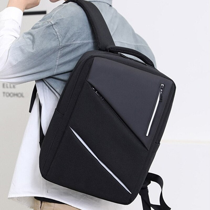 Luxury waterproof nylon backpack for men with USB charging port and multiple compartments, designed for style and functionality.