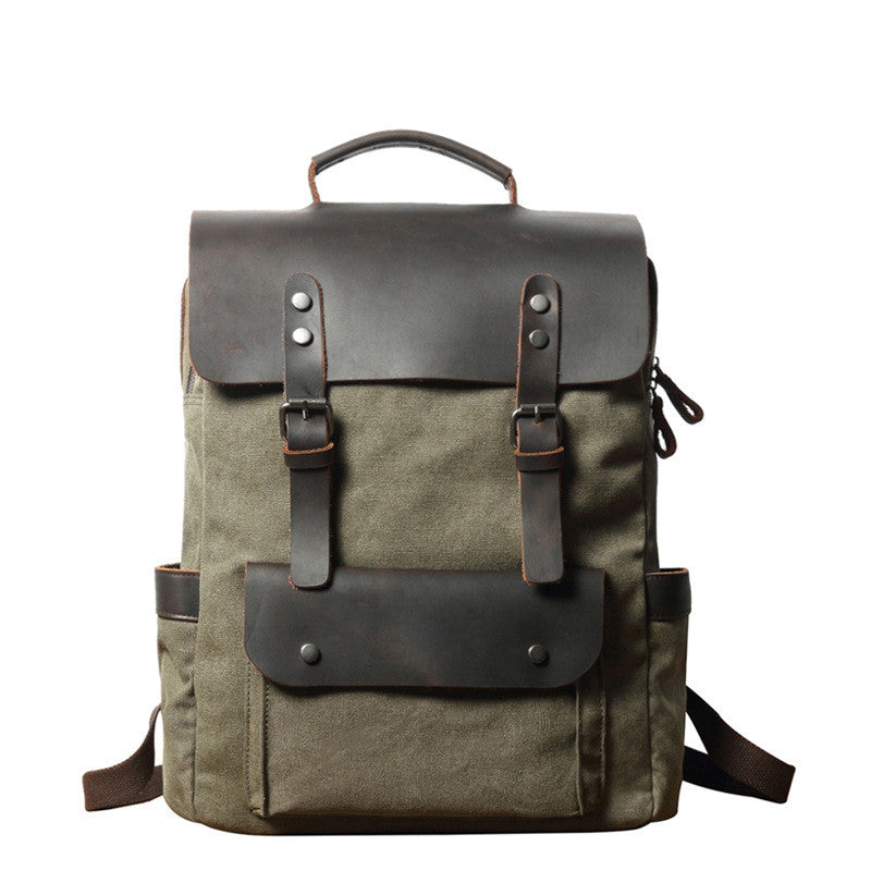 Breathable Leather Outdoor Canvas Backpack in a stylish design, featuring multiple pockets and a curved shoulder strap for comfort.