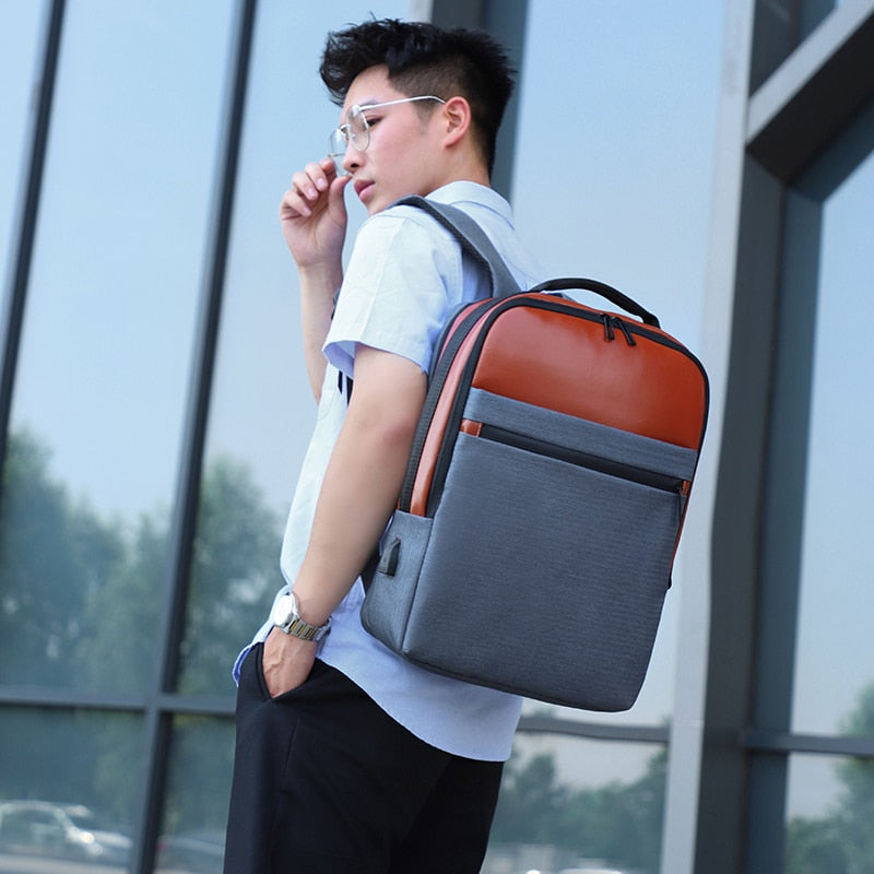 A stylish and functional Business Backpack for Men, featuring a large capacity, USB charging port, and multiple interior pockets for organization.