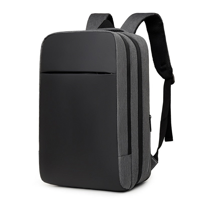 Large-capacity waterproof business backpack for men with USB charging port, featuring a stylish patchwork design and comfortable air cushion belt.