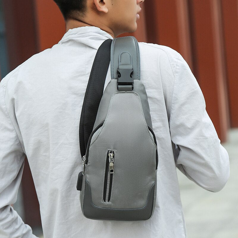 Business crossbody bag for men made of waterproof nylon, featuring multiple interior pockets and a casual design.