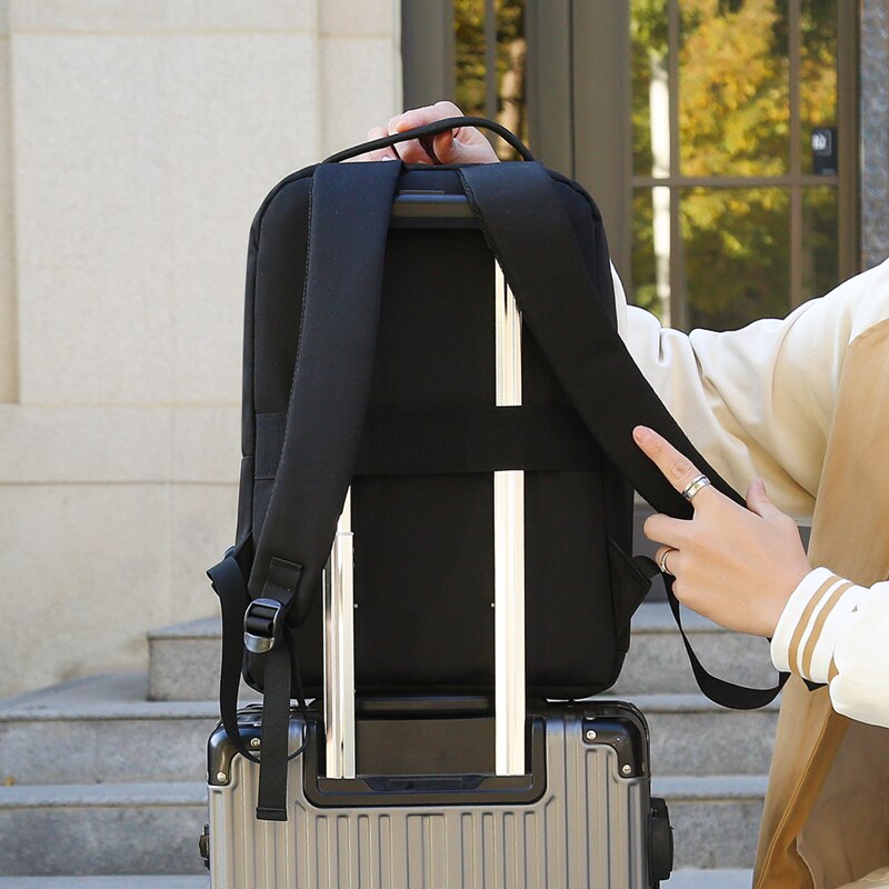 Business Men's Backpack in black, featuring USB charging port, waterproof Oxford material, and multiple interior compartments for organization.