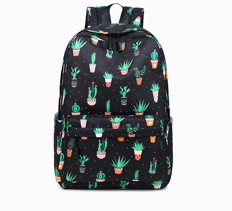 Cactus print female junior high school student backpack with vibrant colors and ergonomic design.