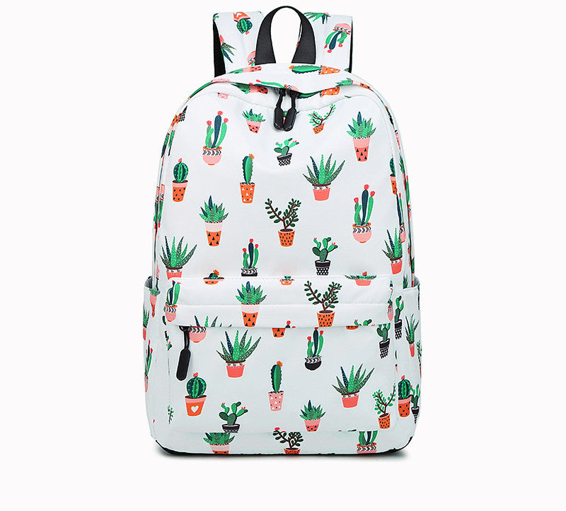 Cactus print female junior high school student backpack with vibrant colors and ergonomic design.