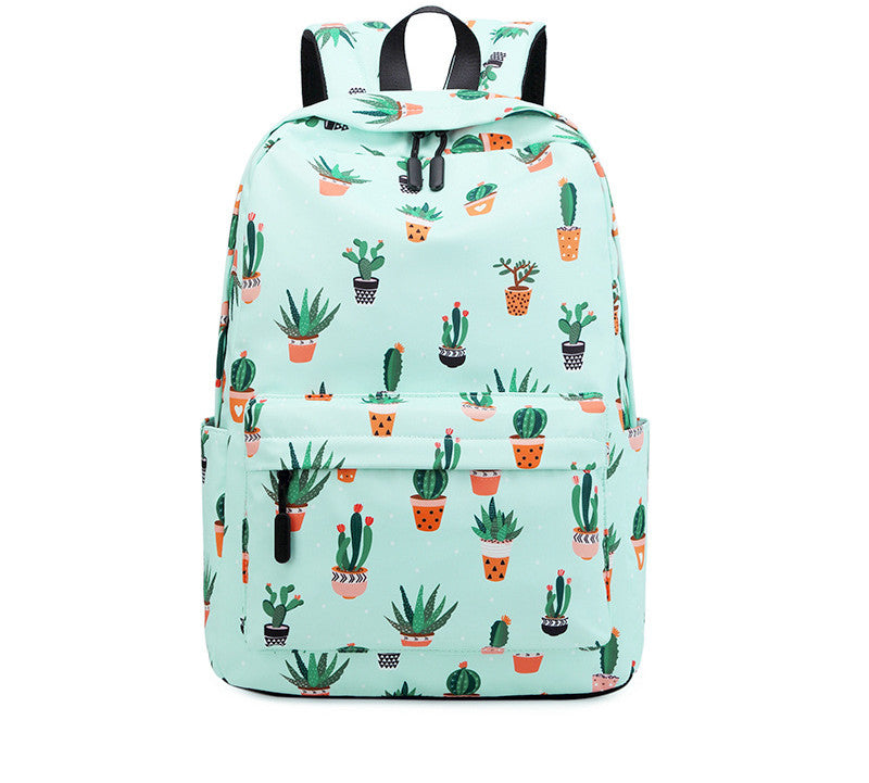 Cactus print female junior high school student backpack with vibrant colors and ergonomic design.