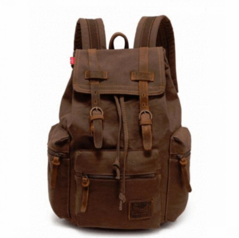 Canvas Casual Traveling Backpack for men and women, featuring heavy cotton canvas and leather trim, designed for comfort and durability.