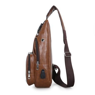 Stylish chest bag made of PU leather with USB charging port, featuring multiple pockets and adjustable straps.