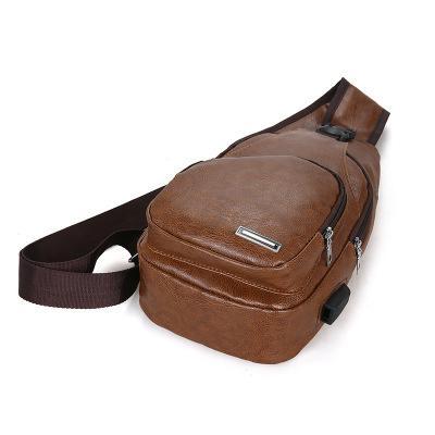 Stylish chest bag made of PU leather with USB charging port, featuring multiple pockets and adjustable straps.