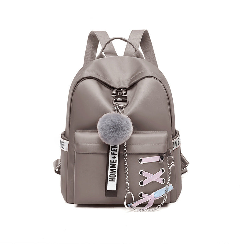 College Wind Casual Female Travel Backpack in stylish design with bow element, made from durable Oxford cloth, featuring multiple pockets.