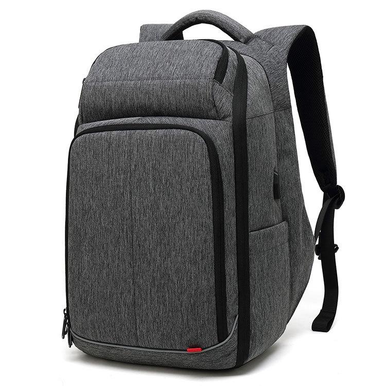 Dry Wet Separation Travel Backpack for Men, featuring a sleek design, multiple pockets, and a durable oxford cloth material.