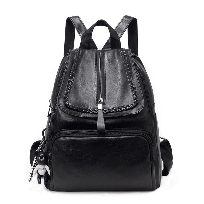 Fashionable large capacity travel backpack for ladies in stylish Korean design, made of durable PU fabric with double straps.