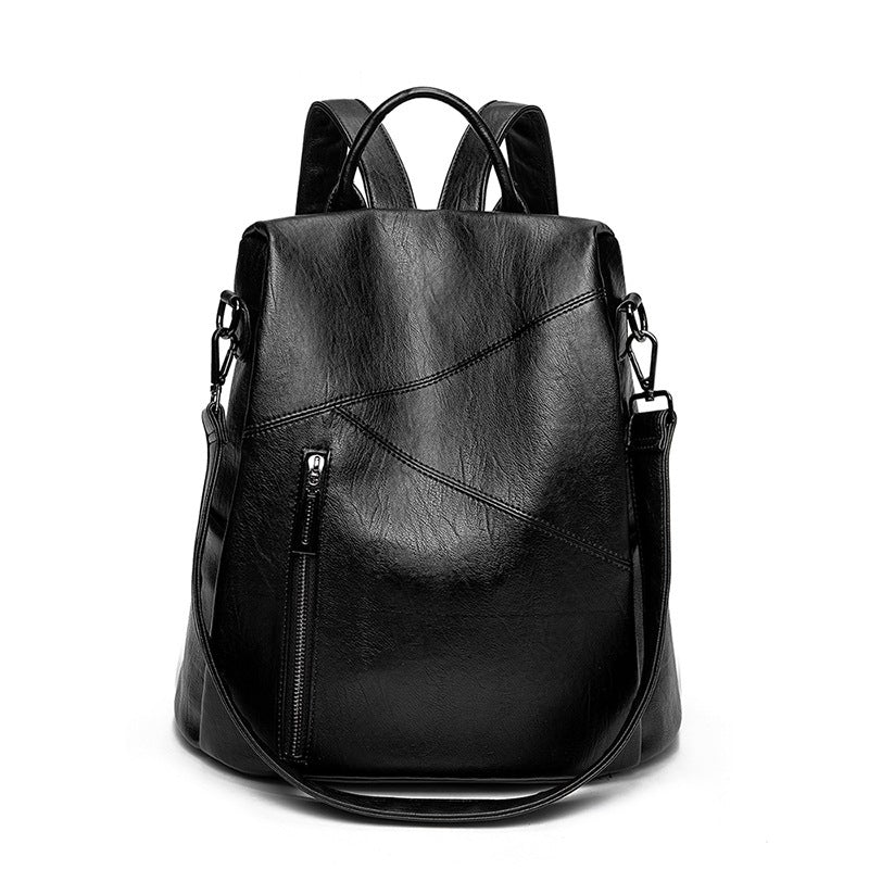 Fashion Multi-purpose Large Travel Backpack in PU material with trendy skin texture, featuring a soft handle and spacious design.