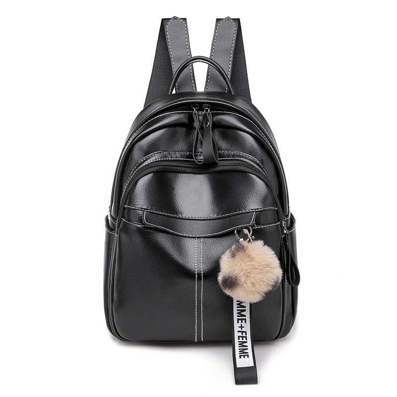 Fashion Simple Soft Leather Travel Backpack in urban style, made from PU fabric, featuring double shoulder straps and multiple compartments.