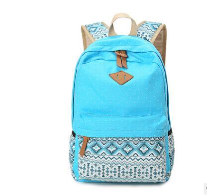 Female canvas travel backpack for hiking, featuring a landscape pattern and multiple pockets for organization.