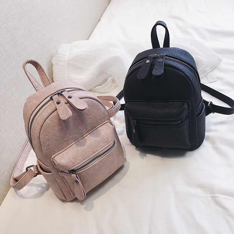 High Quality Casual Fashion Solid Color Lady's Backpack in a stylish design, showcasing its durable material and double shoulder straps.