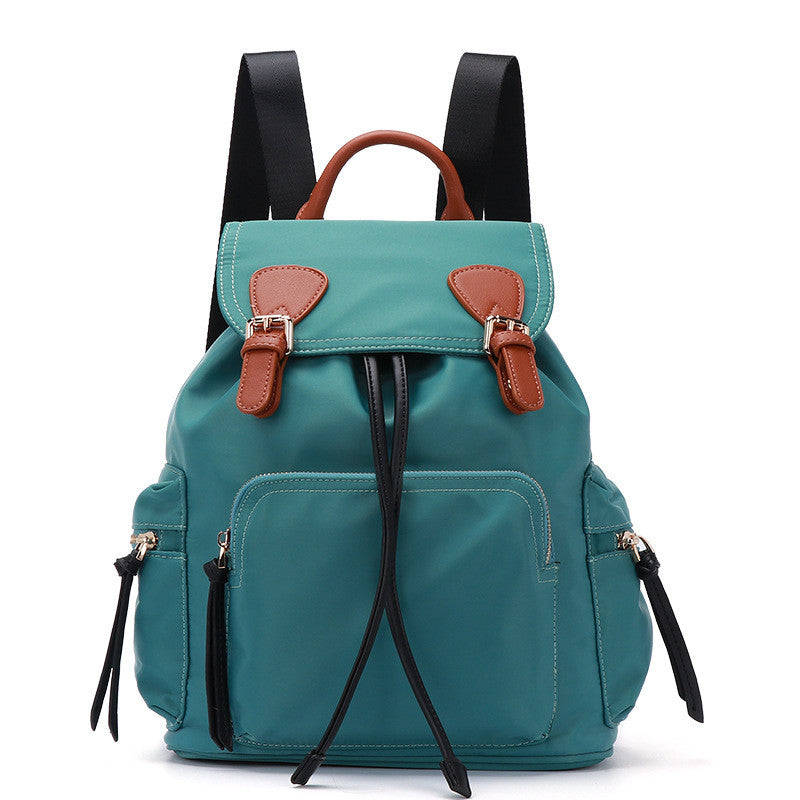 High Quality Casual Fashionable Oxford Cloth Backpack in oval shape with draw buckle closure, showcasing its durable Oxford fabric and spacious design.