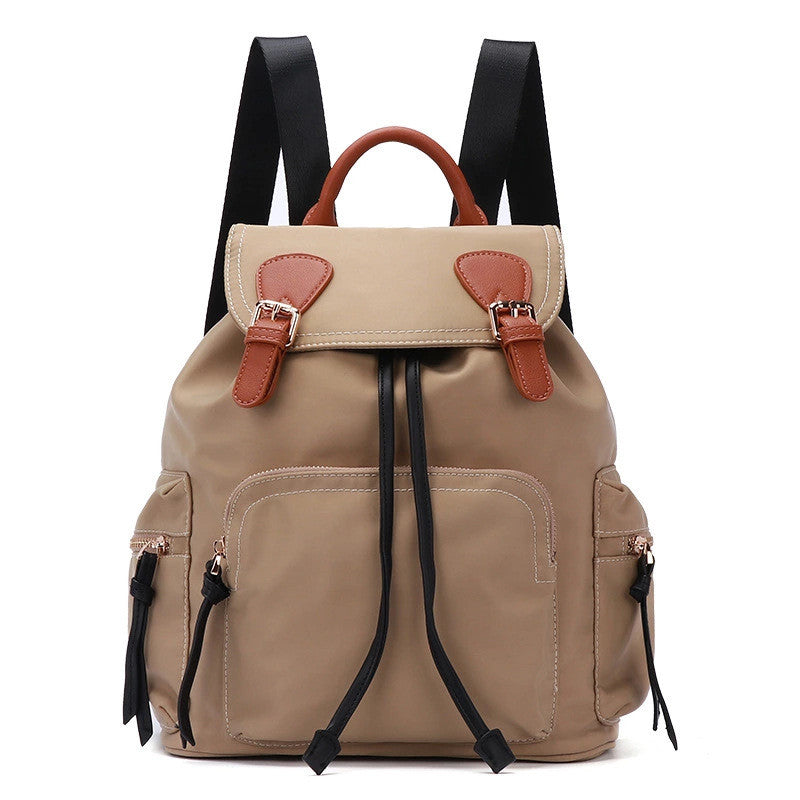 High Quality Casual Fashionable Oxford Cloth Backpack in oval shape with draw buckle closure, showcasing its durable Oxford fabric and spacious design.