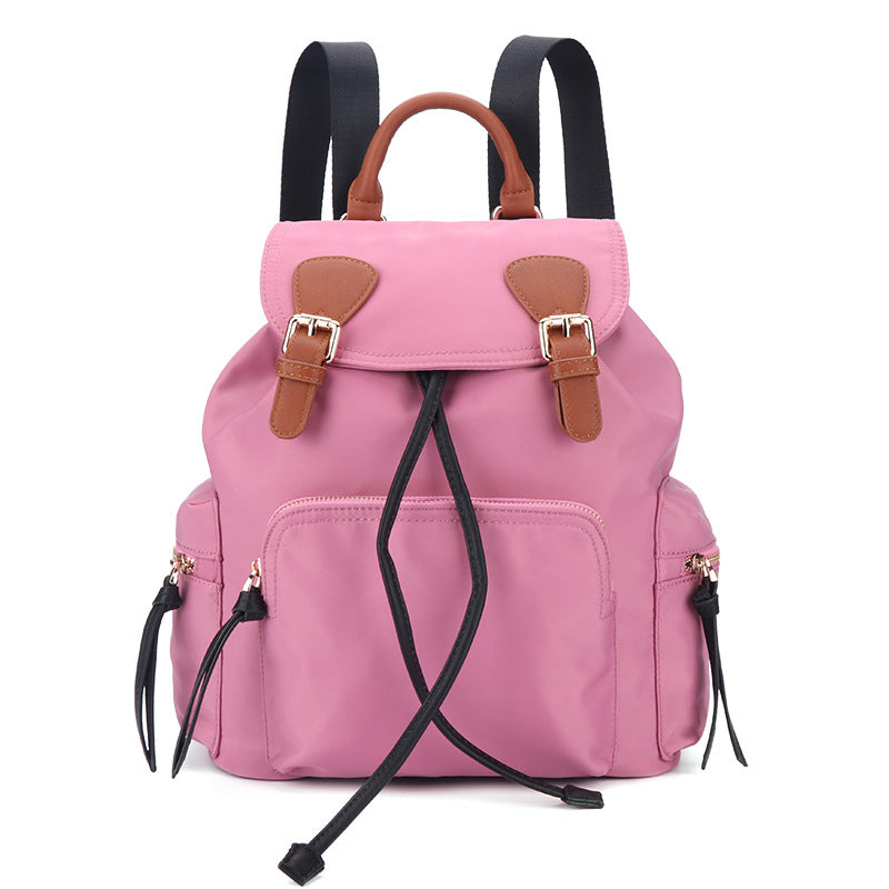 High Quality Casual Fashionable Oxford Cloth Backpack in oval shape with draw buckle closure, showcasing its durable Oxford fabric and spacious design.