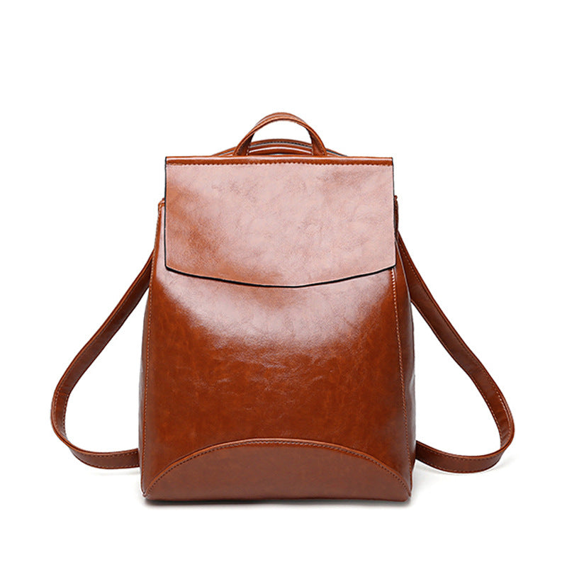 Ladies Korean Version Leisure College Style Backpack in stylish PU leather, featuring double straps and anti-theft design, perfect for travel and daily use.