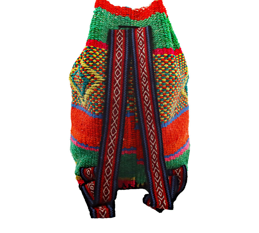 Lagó Spring Green Boho-Style Backpack featuring vibrant colors and geometric designs, handwoven by Quechua artisans.